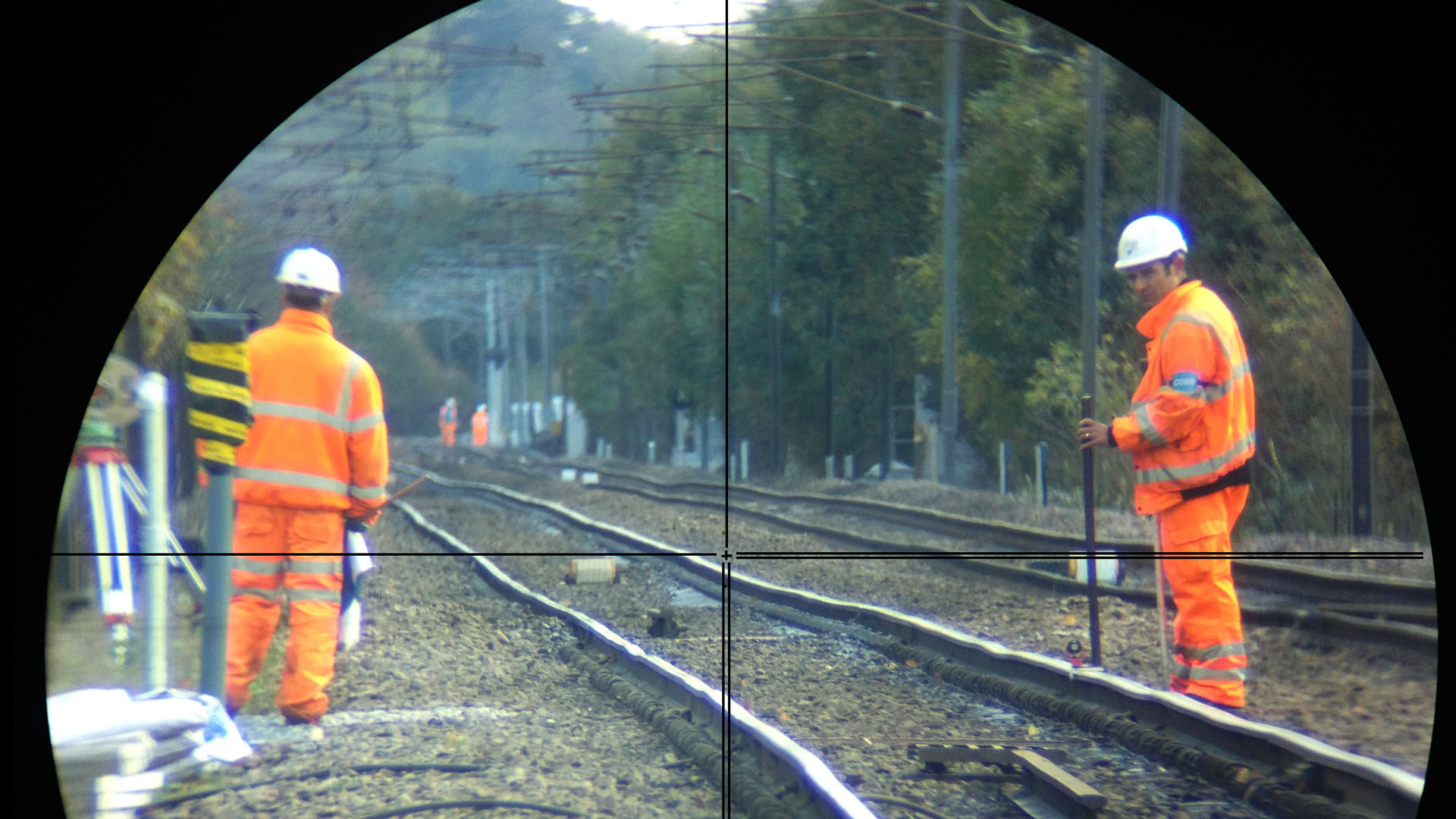 View looking through a Leica Total Station along the railway